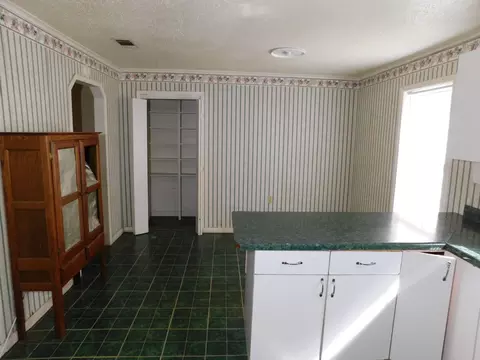Kitchen - 505 South St, Springhill, LA 71075 photo 2 of 2