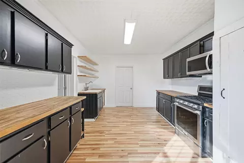 Kitchen - 507 E Maple St, Whitewright, TX 75491 photo 1 of 3
