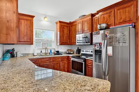 Kitchen - 203 Mockingbird St, Ector, TX 75439 photo 1 of 2