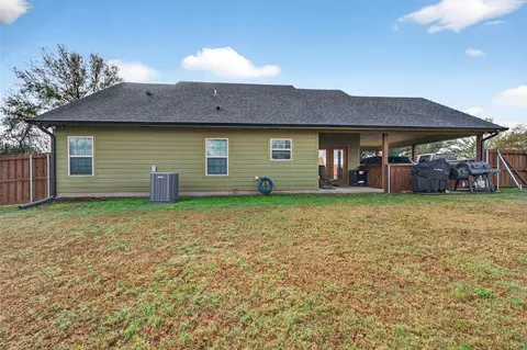 Exterior - 203 Mockingbird St, Ector, TX 75439 photo 8 of 8