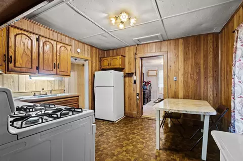 Kitchen - 512 S Lamar Ave, Denison, TX 75021 photo 1 of 2