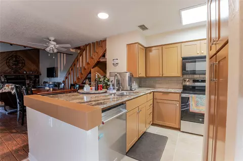 Kitchen - 3037 Hells Gate Loop #C208, Strawn, TX 76475 photo 1 of 2
