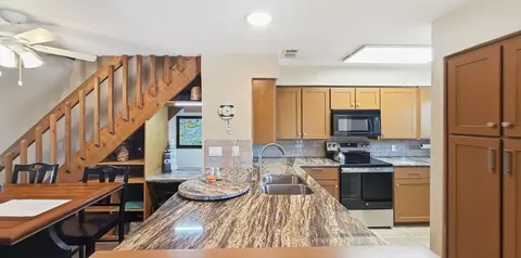 Kitchen - 3037 Hells Gate Loop #C208, Strawn, TX 76475 photo 3 of 3