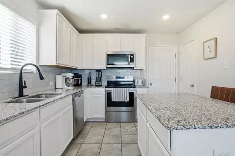 Kitchen - 1719 Ackerly Dr, Forney, TX 75126 photo 2 of 3