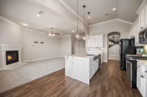 Living - 16701 Millenium Park Pl, Prosper, TX 75078 photo 2 of 4