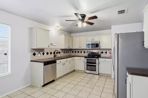 Kitchen - 205 Broken Arrow, Krum, TX 76249 photo 2 of 2