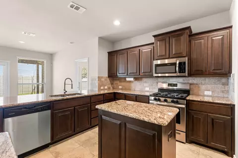Kitchen - 513 Gannet Trl, Argyle, TX 76226 photo 4 of 6