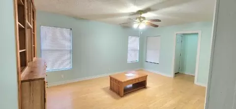 Living - 108 E Maple St, Keene, TX 76059 photo 2 of 2