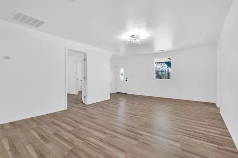 Living - 909 E Sears St, Denison, TX 75021 photo 3 of 6