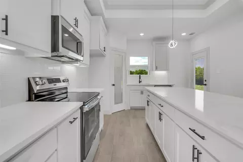 Kitchen - 504 E Ball St, Tom Bean, TX 75489 photo 2 of 2