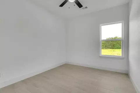 Bedroom - 504 E Ball St, Tom Bean, TX 75489 photo 8 of 10