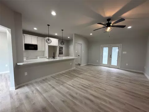 Living - 317 N Clark St, Comanche, TX 76442 photo 2 of 3