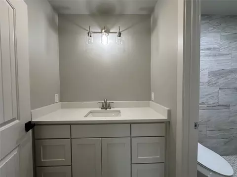 Bath - 317 N Clark St, Comanche, TX 76442 photo 9 of 10