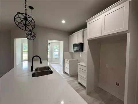 Kitchen - 317 N Clark St, Comanche, TX 76442 photo 2 of 6