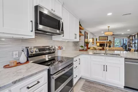 Kitchen - 3033 Hells Gate Loop #E103, Strawn, TX 76475 photo 3 of 4