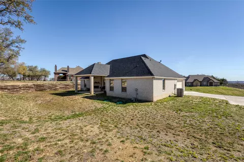Exterior - 1041 Tex Ln, Springtown, TX 76082 photo 5 of 8