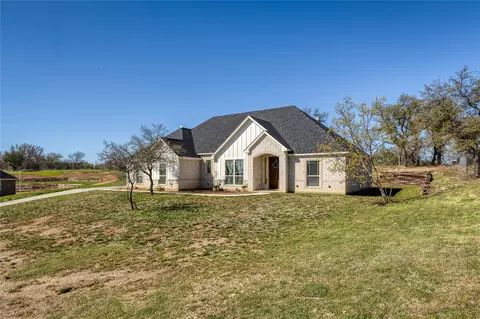 Exterior - 1041 Tex Ln, Springtown, TX 76082 photo 3 of 8