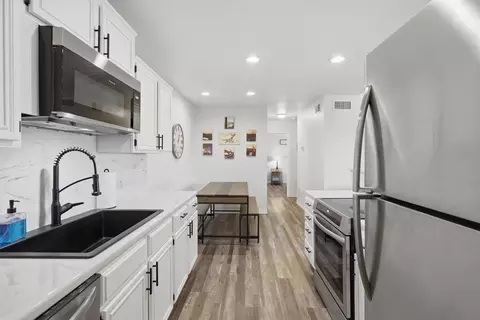 Kitchen - 3069 Hells Gate Loop #32, Strawn, TX 76475 photo 3 of 3