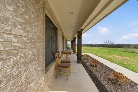 Exterior - 301 Rhoades Ln, Springtown, TX 76082 photo 3 of 4