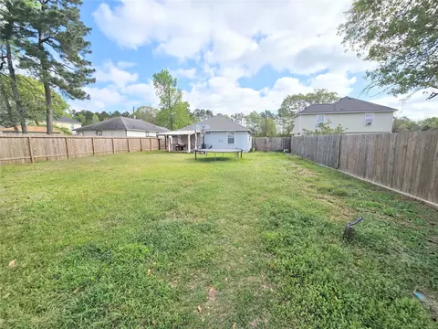 Exterior - 8853 E Buffalo Cir, Willis, TX 77378 photo 5 of 7
