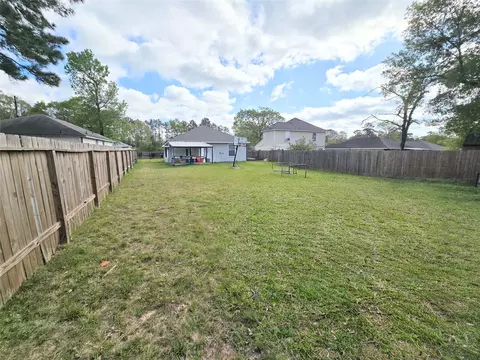 Exterior - 8853 E Buffalo Cir, Willis, TX 77378 photo 6 of 7