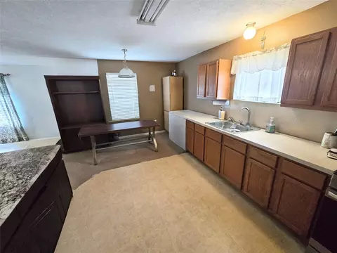 Kitchen - 8853 E Buffalo Cir, Willis, TX 77378 photo 3 of 3