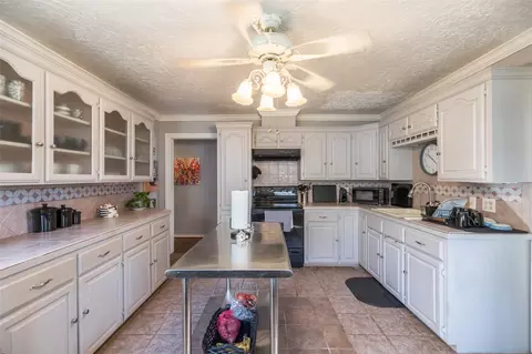 Kitchen - 703 E 21st St, Cisco, TX 76437 photo 2 of 2