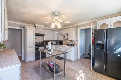 Kitchen - 703 E 21st St, Cisco, TX 76437 photo 1 of 2