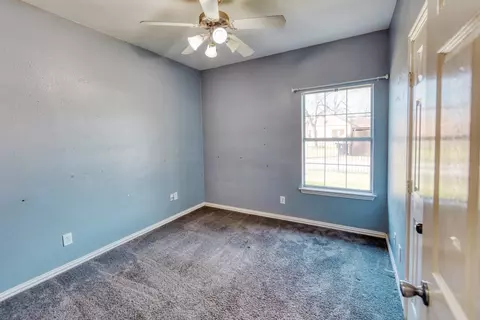 Bedroom - 216 E 220 E Walcott St, Pilot Point, TX 76258 photo 2 of 3