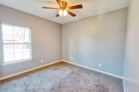 Bedroom - 216 E 220 E Walcott St, Pilot Point, TX 76258 photo 3 of 3