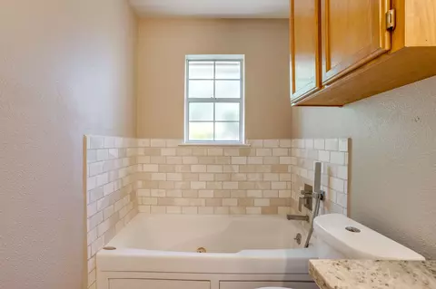 Bath - 108 S Douglas St, Covington, TX 76636 photo 2 of 5