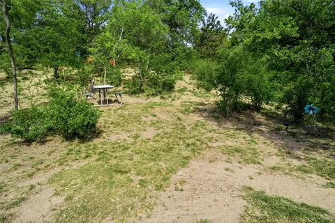 Exterior - 1024 Tex Ln, Springtown, TX 76082 photo 9 of 15