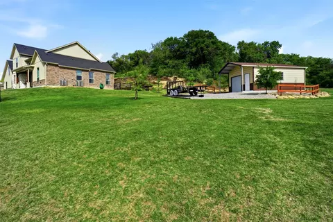 Exterior - 1024 Tex Ln, Springtown, TX 76082 photo 12 of 15