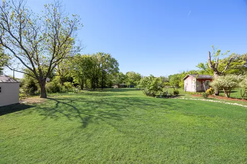 Exterior - 213 E 3rd St, Keene, TX 76059 photo 4 of 11