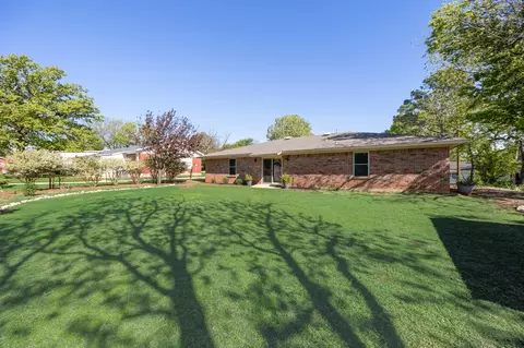 Exterior - 213 E 3rd St, Keene, TX 76059 photo 8 of 11