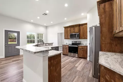 Kitchen - 903 W Cardinal St, Ector, TX 75439 photo 3 of 4