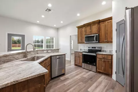 Kitchen - 903 W Cardinal St, Ector, TX 75439 photo 1 of 4