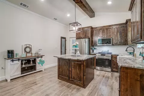 Kitchen - 313 Broken Rd, Perrin, TX 76486 photo 2 of 7