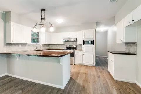 Kitchen - 1533 E Springcrest Cir, Lancaster, TX 75134 photo 3 of 5