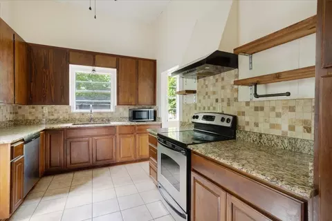 Kitchen - 310 E 3rd St, Mount Pleasant, TX 75455 photo 1 of 4