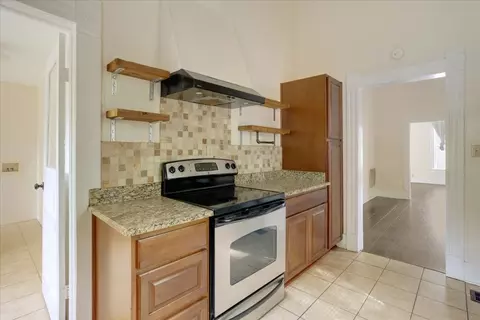 Kitchen - 310 E 3rd St, Mount Pleasant, TX 75455 photo 2 of 4