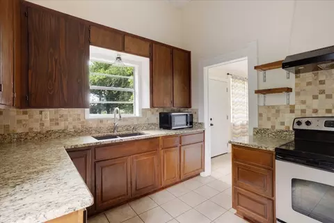 Kitchen - 310 E 3rd St, Mount Pleasant, TX 75455 photo 3 of 4