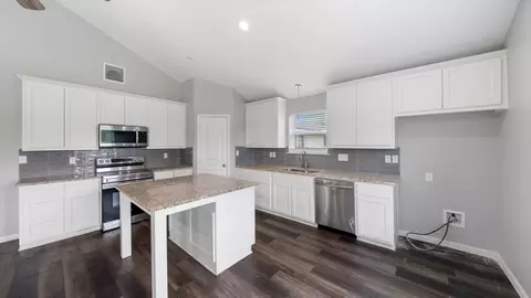 Kitchen - 207 E Mccoulskey St, Terrell, TX 75160 photo 1 of 2