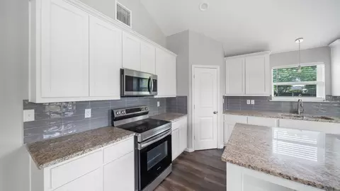 Kitchen - 207 E Mccoulskey St, Terrell, TX 75160 photo 2 of 2