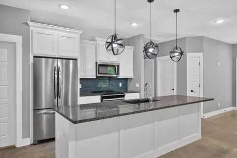Kitchen - 707 E Woodard St, Denison, TX 75021 photo 3 of 5