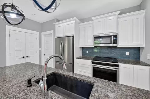 Kitchen - 707 E Woodard St, Denison, TX 75021 photo 5 of 5