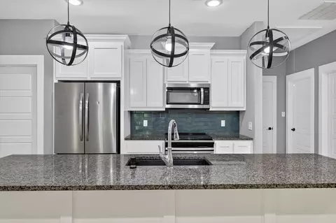 Kitchen - 707 E Woodard St, Denison, TX 75021 photo 4 of 5
