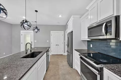 Kitchen - 707 E Woodard St, Denison, TX 75021 photo 2 of 5