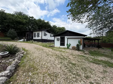 Exterior - 111 Apache Trl, Whitney, TX 76692 photo 2 of 9
