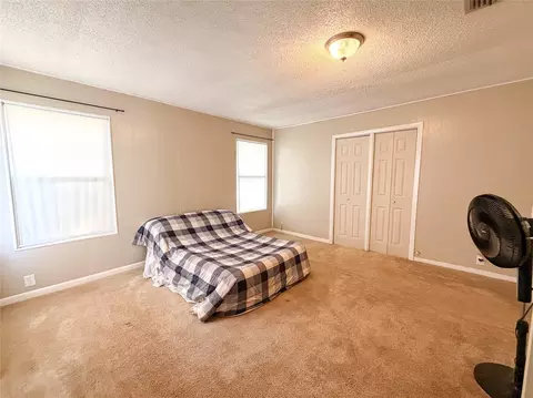 Bedroom - 1002 N Avenue H, Haskell, TX 79521 photo 2 of 3